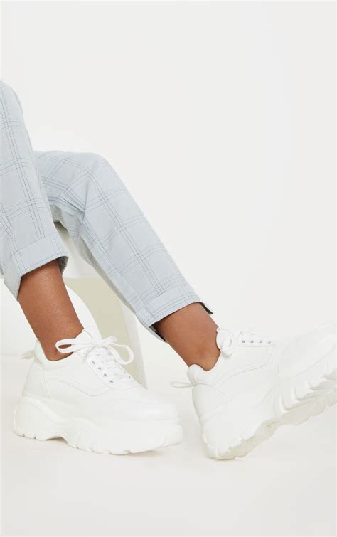 chunky white platform sneakers.